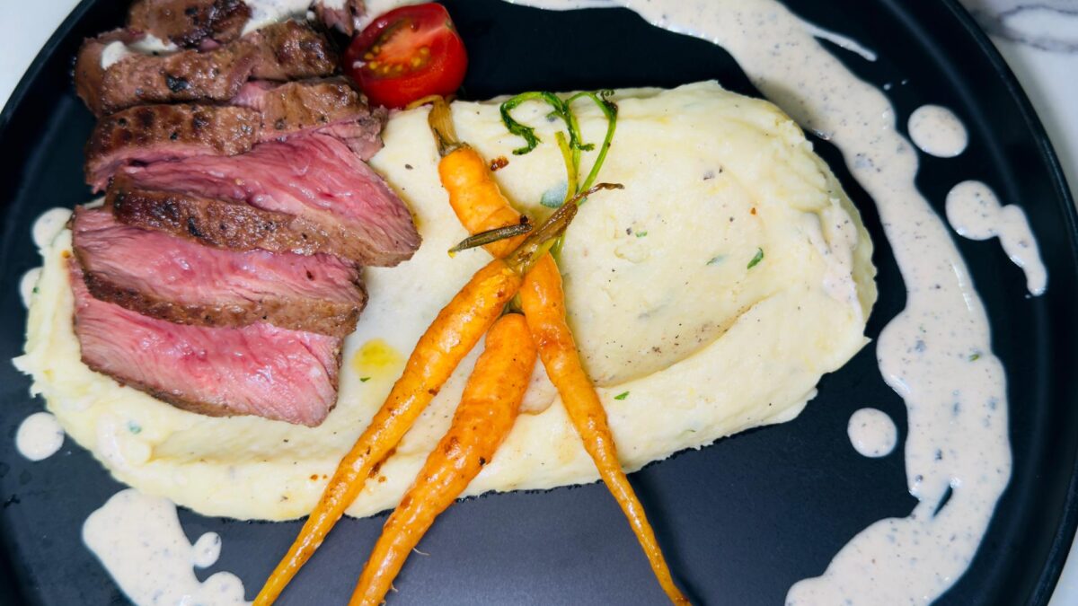 Pan-Seared Steak (Medium-Well) with Creamy Mashed Potatoes, Black Pepper Sauce & Sautéed Baby Carrots